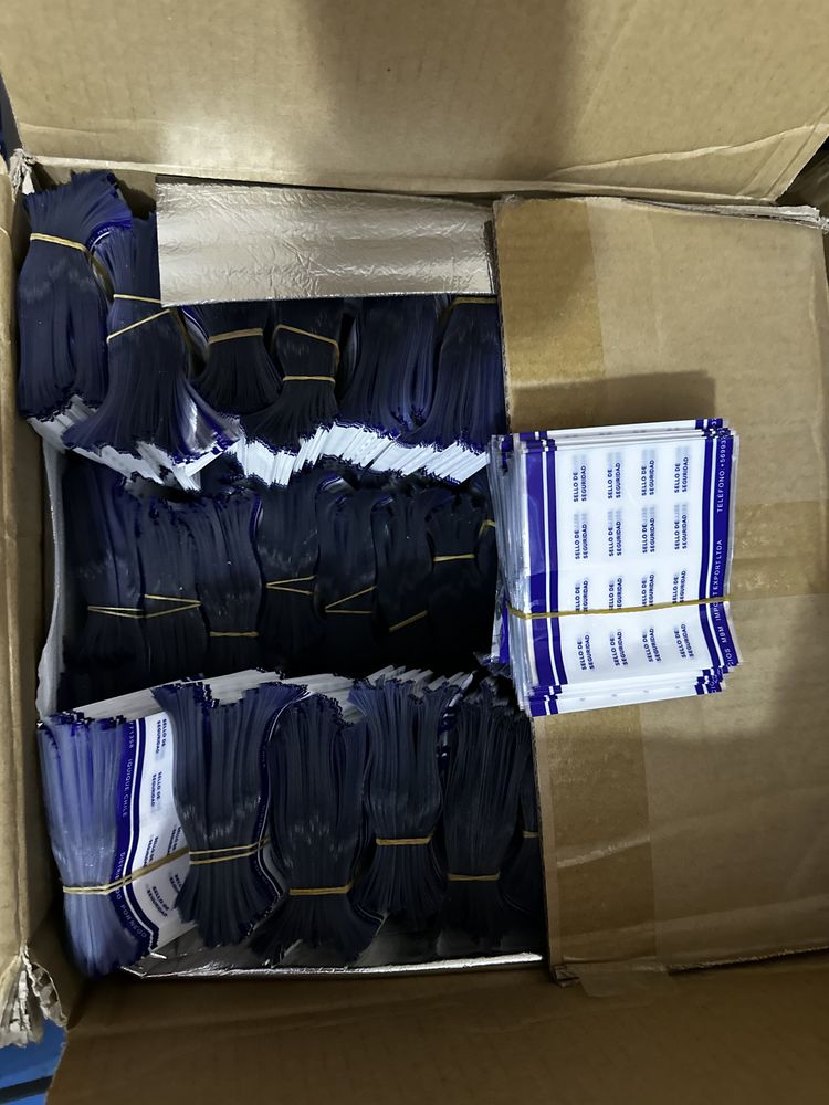 Precintos de seguridad para sellar tapas de bidones de agua. Material termoencogible que garantiza que el envase no ha sido abierto. 3